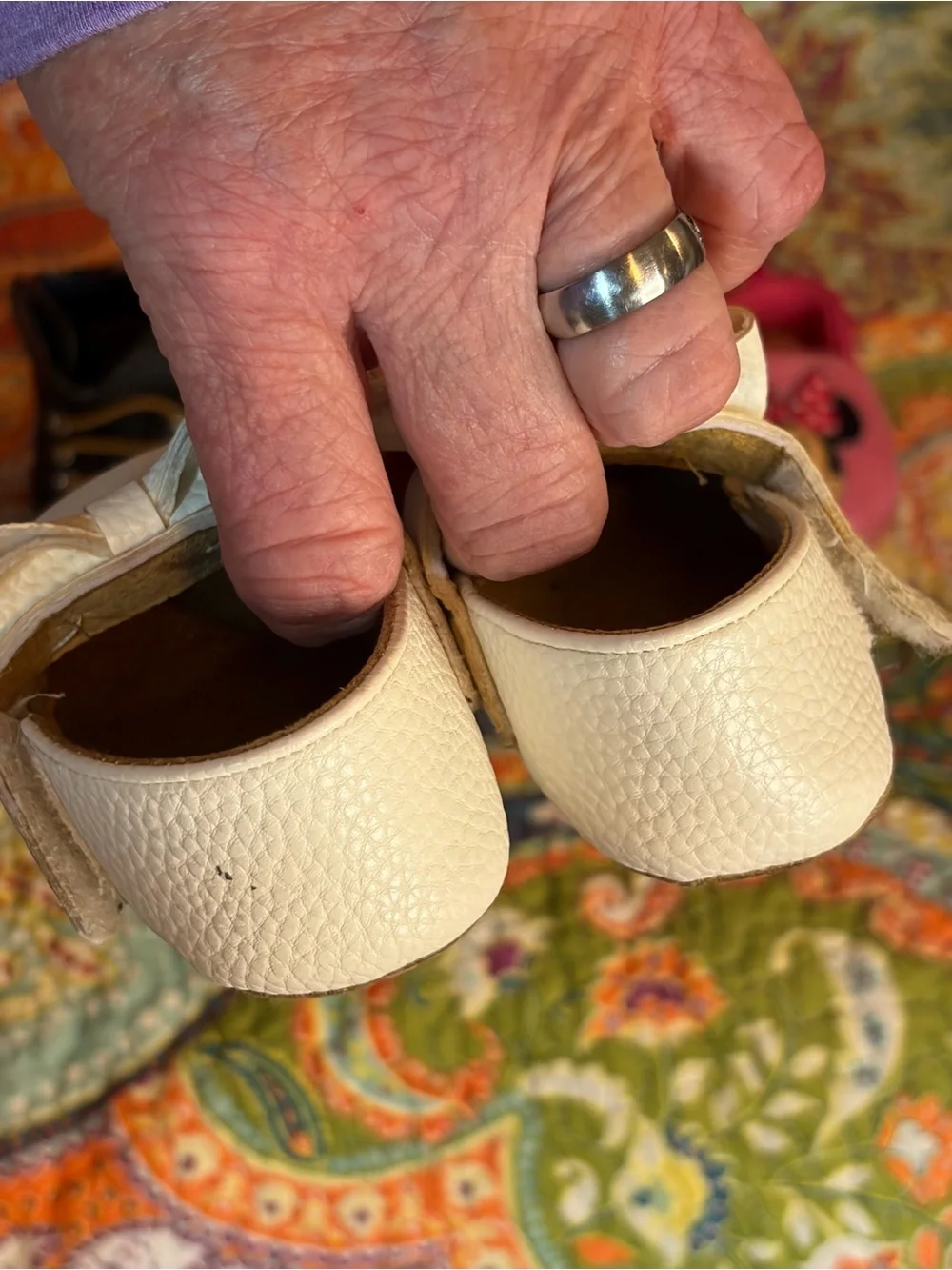 Lot of three pairs of Baby shoes.